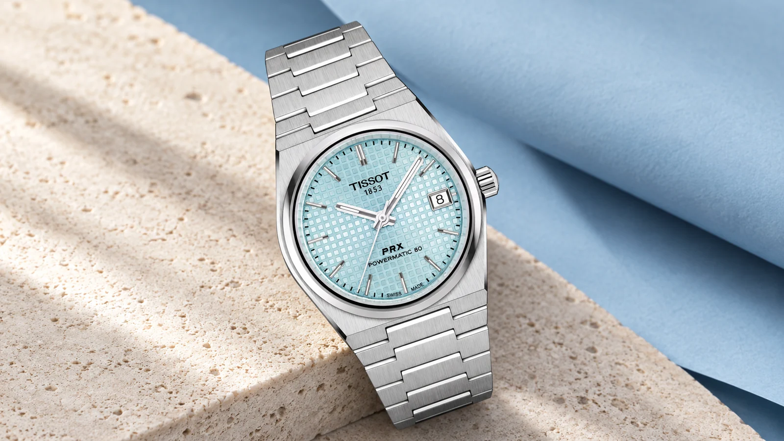 Tissot PRX Powermatic 80 T137.207.11.351.00 с фактурным голубым циферблатом на камне и синей бумаге